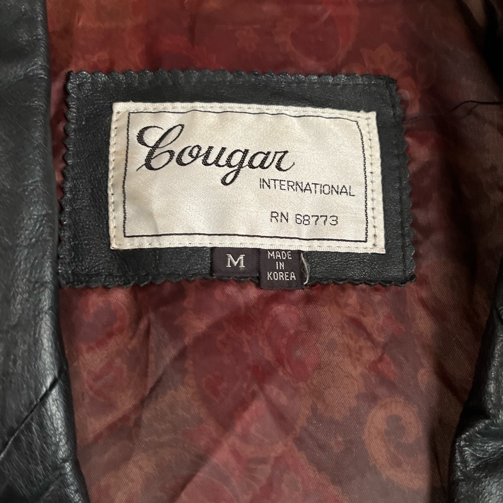 leather jacket , casual fall wear , fits like a large , black leather